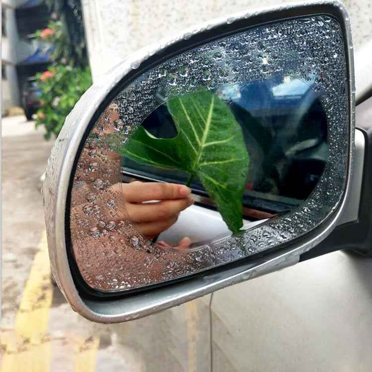 Car Oval PET Rearview Mirror Protective Window Clear Anti-fog Waterproof Rain Shield Film, Size:10x15cm