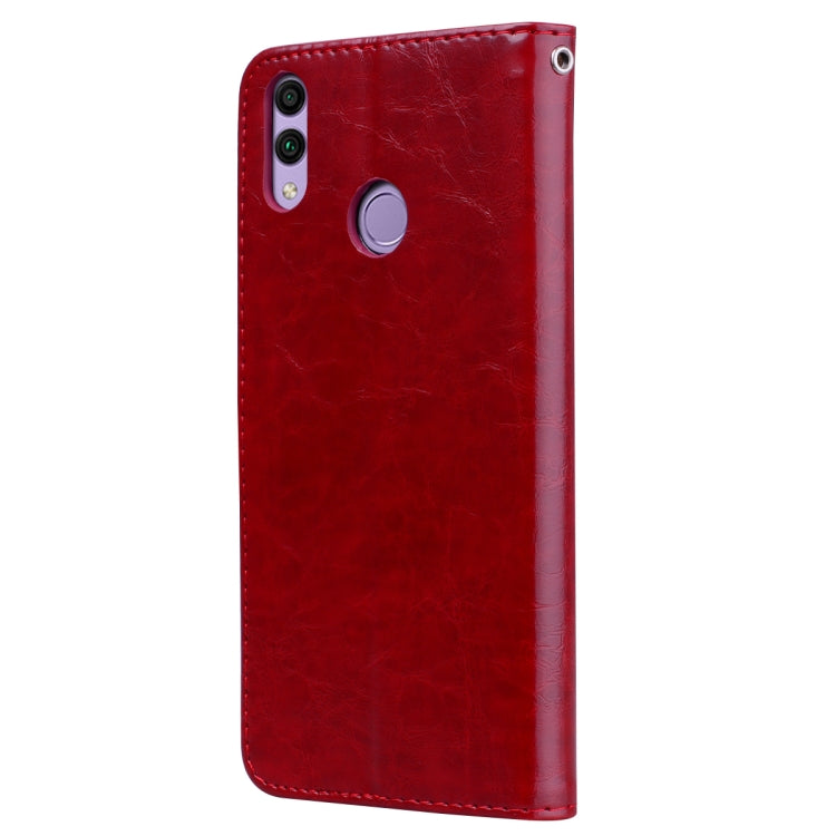Étui à rabat horizontal en cuir texturé style business pour Huawei Honor 8C, avec support, emplacements pour cartes et portefeuille.