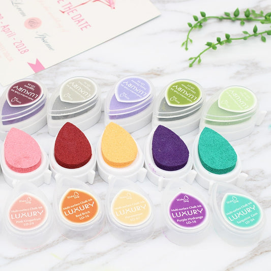 Almohadilla de tinta con gotas de agua, ideal para niños, para sellos, para manualidades, scrapbooking, con forma de gota, colores aleatorios, 2 unidades