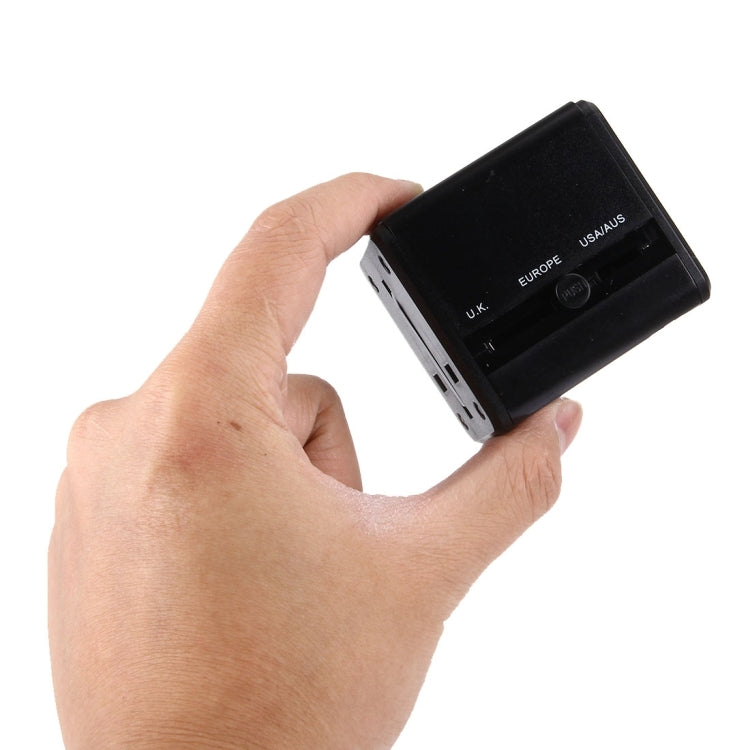 Adaptador de enchufes universales de viaje ocultables con dos puertos USB integrados y cargador para EE. UU., Reino Unido, Australia y la UE.