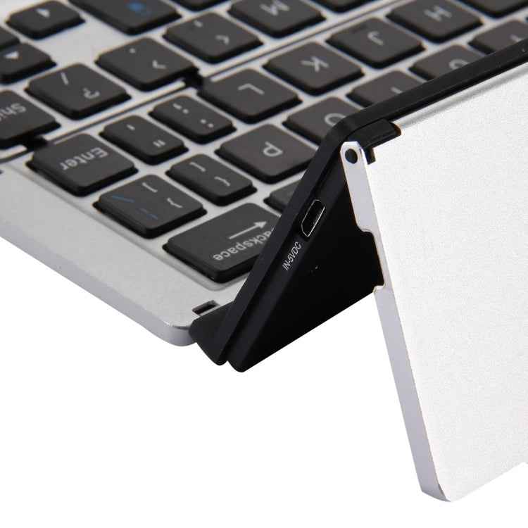 F18 Ultra-slim Rechargeable Foldable 58 Keys Bluetooth Wireless Keyboard with Holder